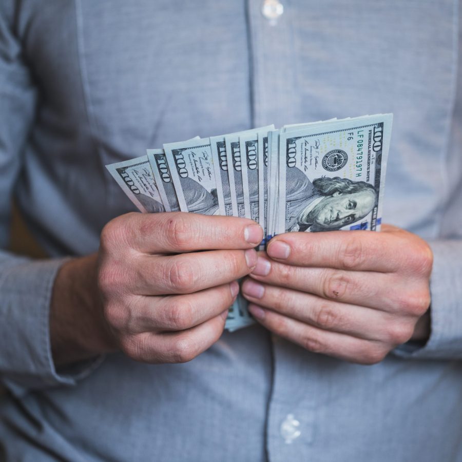 Businessman holding money in his hands